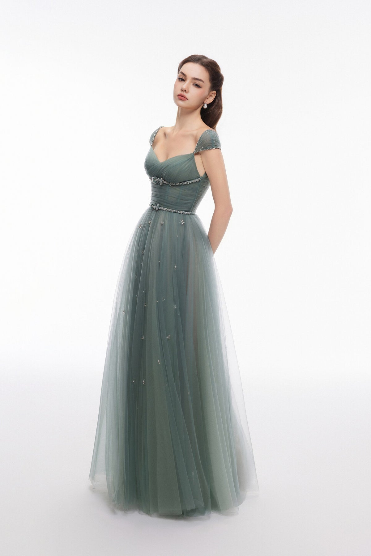 NEALA green A-line evening dress by Joséphine with embellished cap sleeves and draped bodice