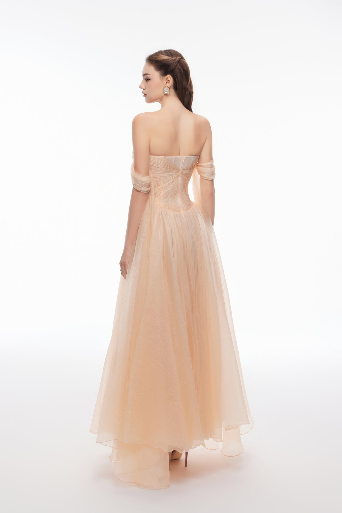 Joséphine EDANA dress in Orange, back view showing the fitted bodice and long draped panels.
