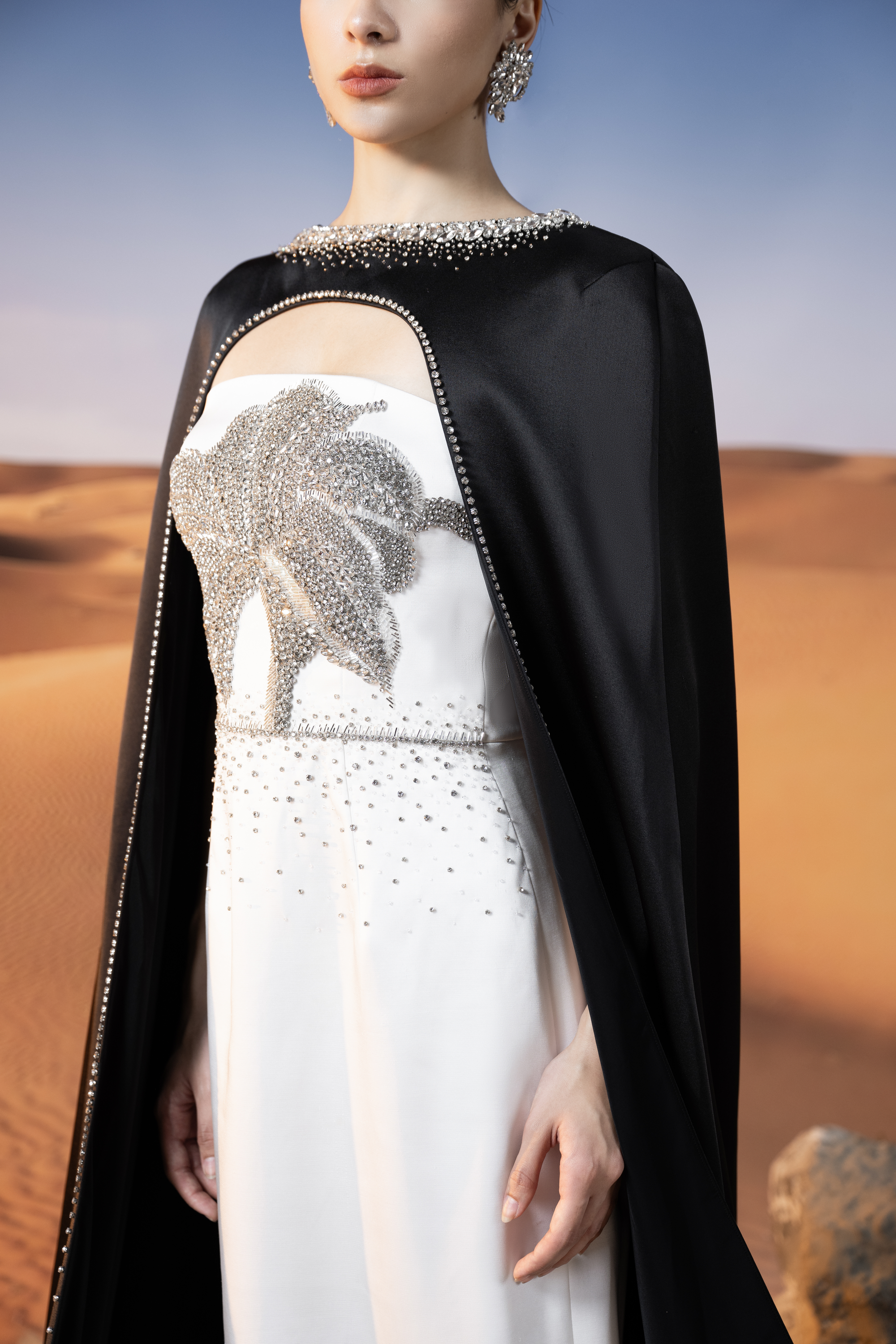 Embellished White Column Gown with Black Cape