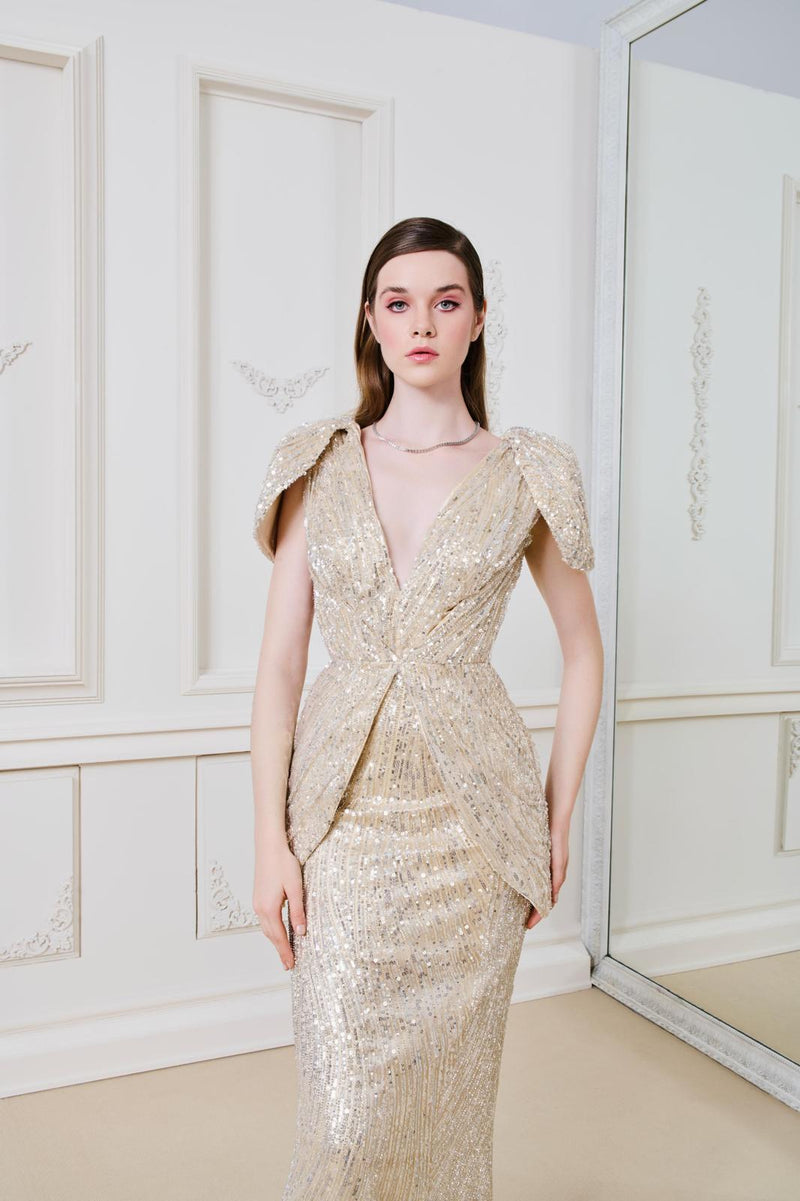 Li Beirut M1138 – Gold Sequin Deep V Evening Gown with Sculptural Hip Panels