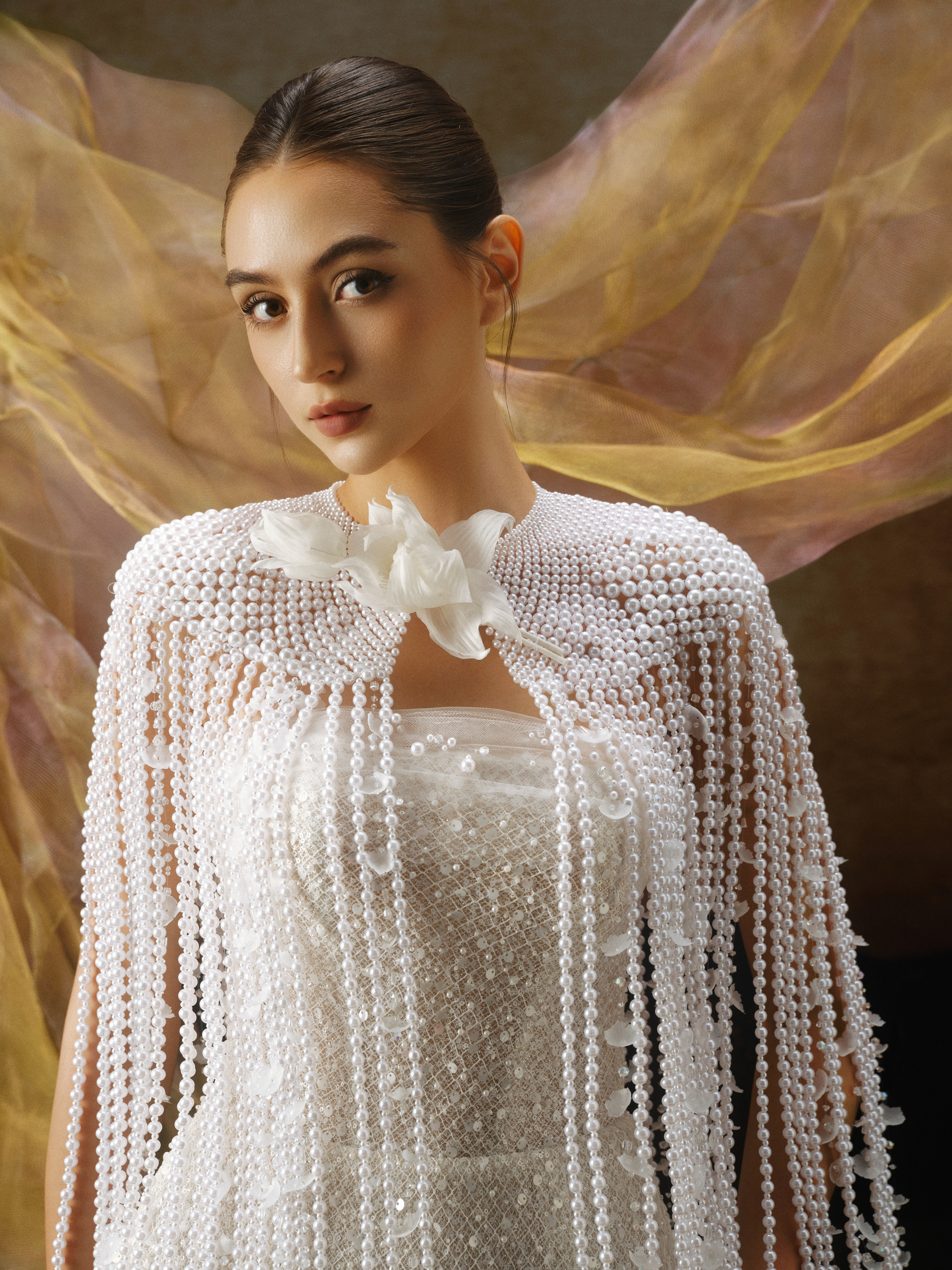 Linh Nga LMBCT298 – Strapless Beaded Gown with Sheer Cape Overlay