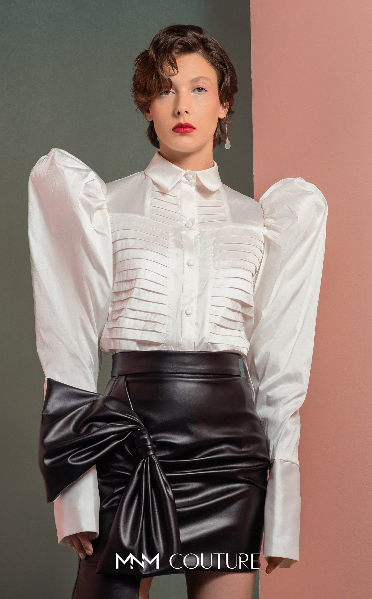 Style GOF2502 Puff-Shoulders Taffeta Blouse with Pleated Front Asymmetrical Leather Skirt with Bold Side Bow