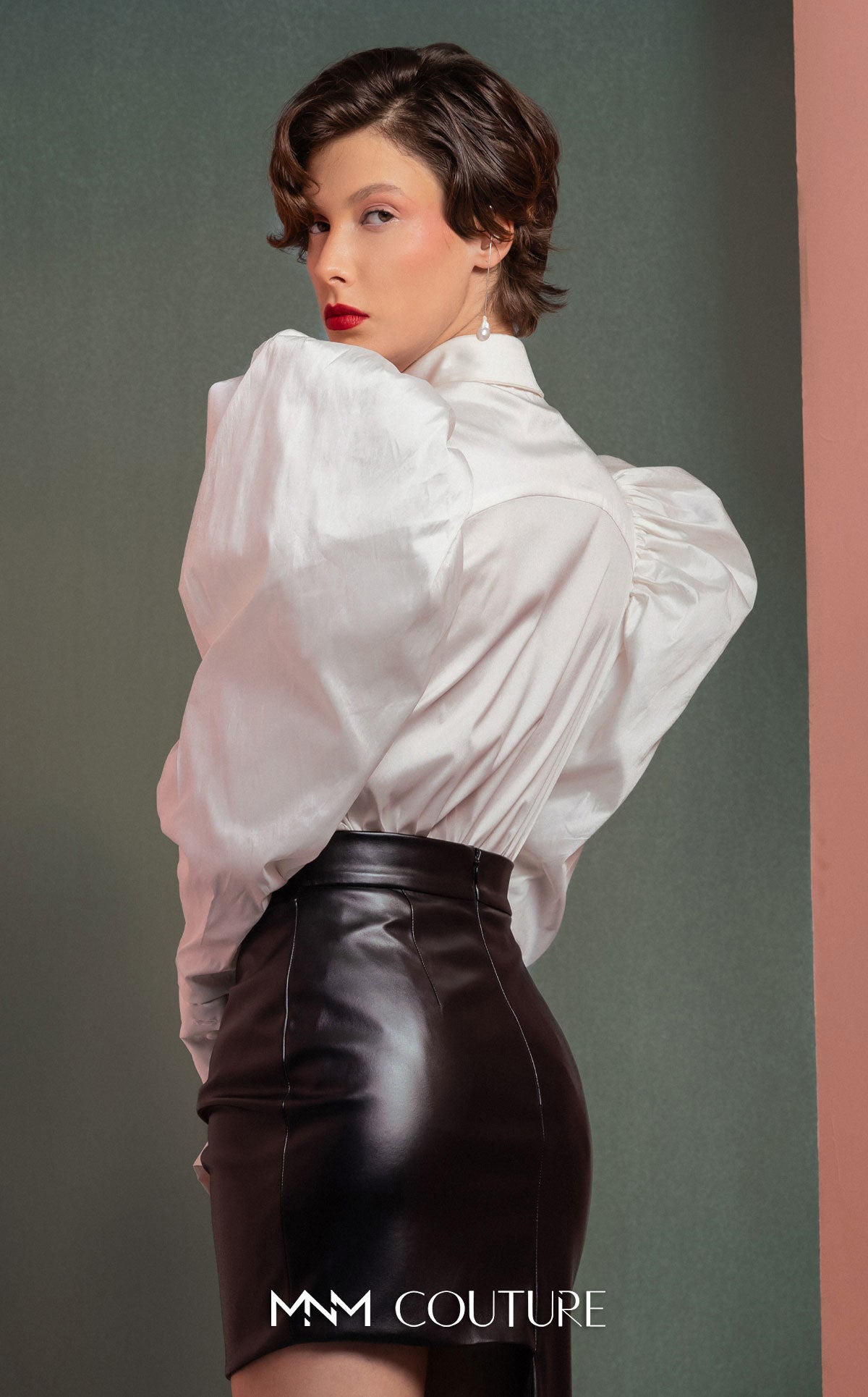 Style GOF2502 Puff-Shoulders Taffeta Blouse with Pleated Front Asymmetrical Leather Skirt with Bold Side Bow