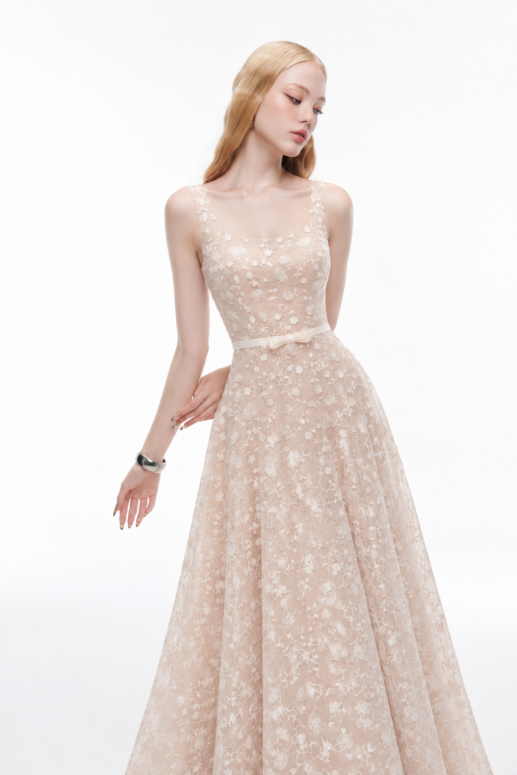 Joséphine IVORY dress in Beige, close-up of floral lace, neckline and bow waist.