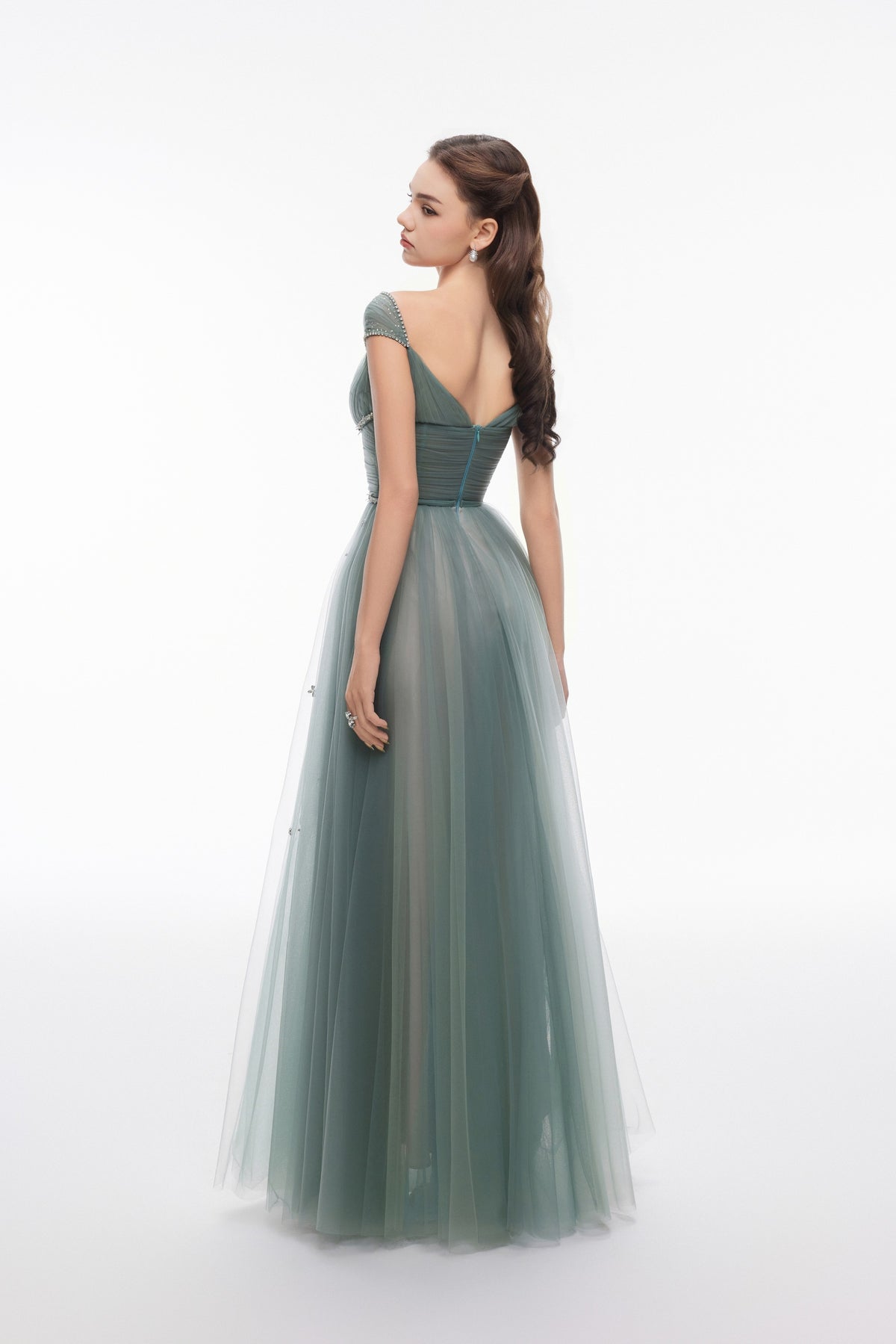 NEALA green gown by Joséphine, back view showing V-shaped back and center zipper