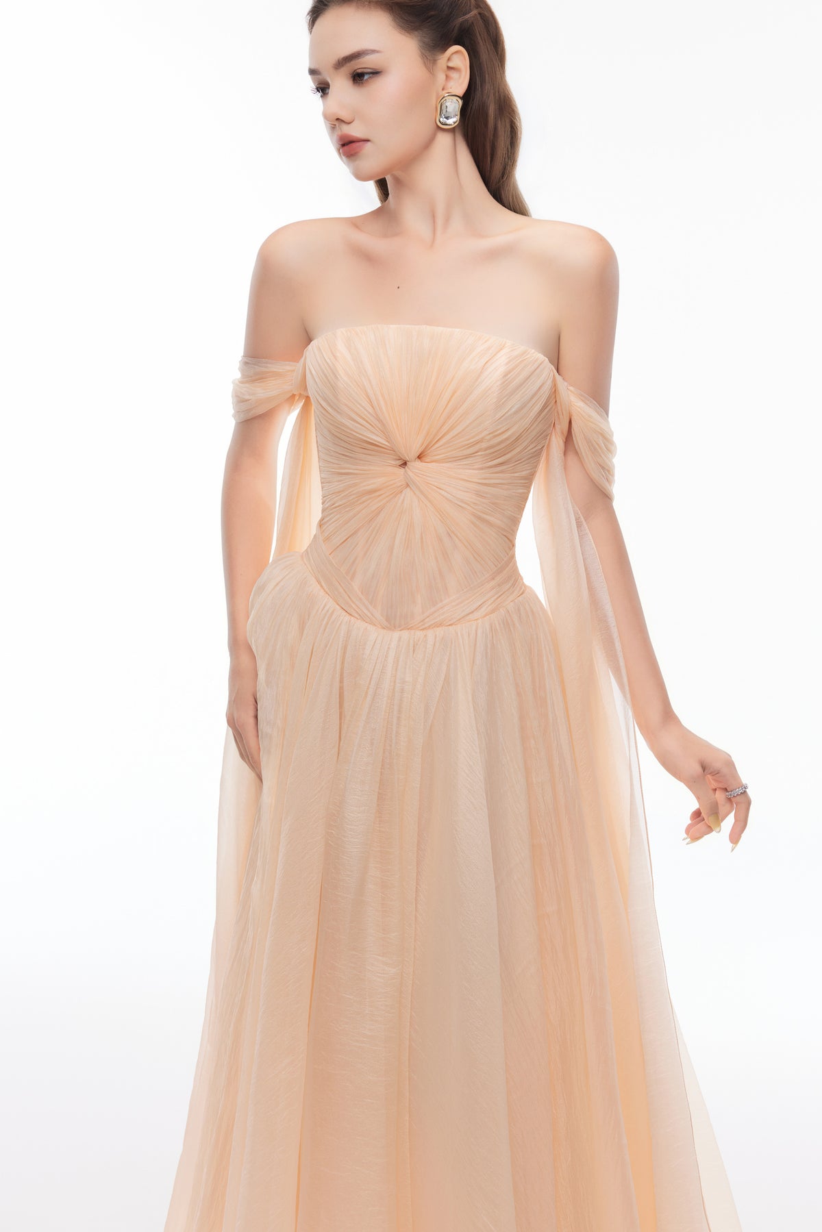 Joséphine EDANA dress in Orange, close view of the twist-front bodice and off-shoulder bands.