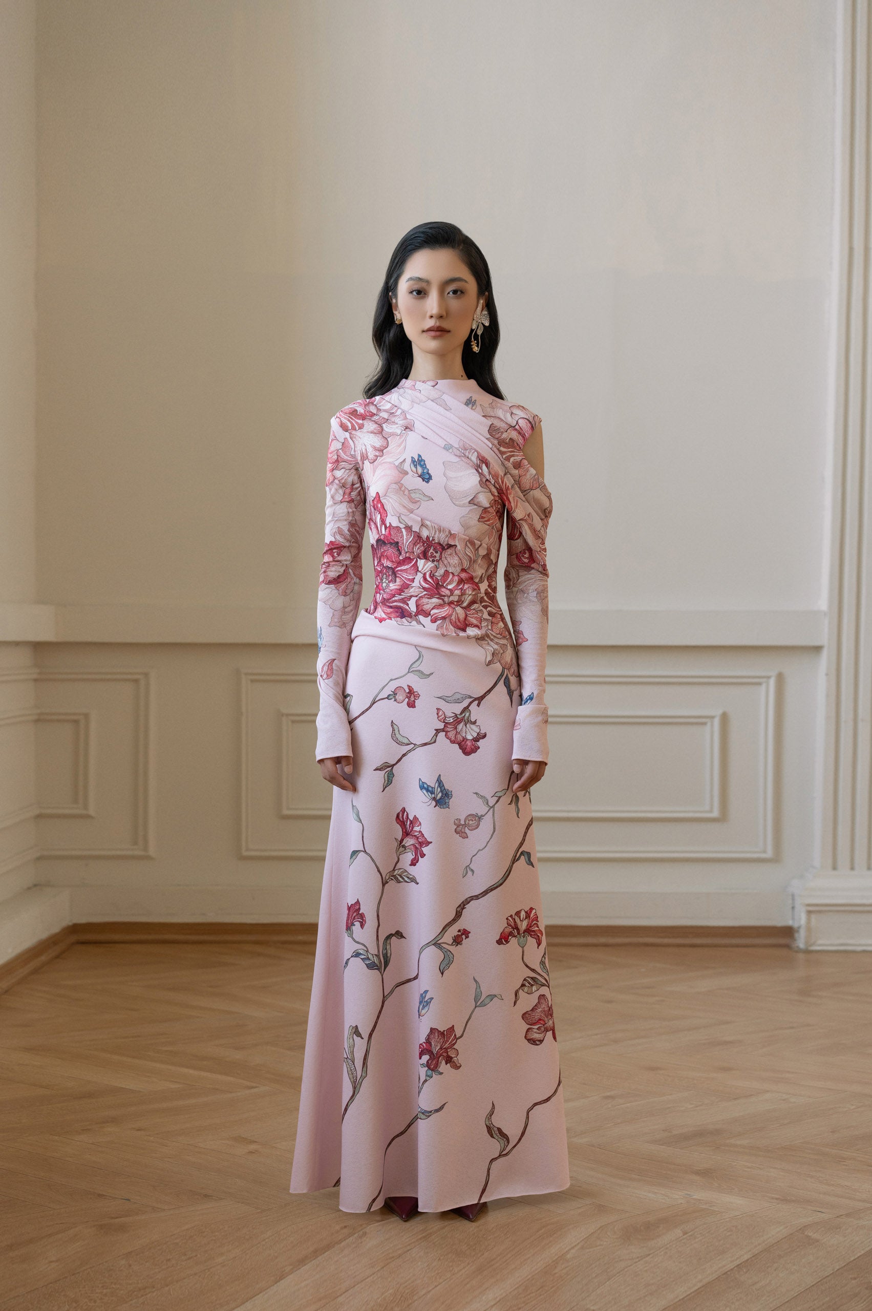 Shaira Offical | | A Stylish Mermaid Dress In Cherry Blossom Pink, Featuring A Draped Neckline, Asymmetric Sleeves, And 3D Draping At The Waist. Shaira Offical | | A Stylish Mermaid Dress In Cherry Blossom Pink, Featuring A Draped Neckline, Asymmetric Sleeves, And 3D Draping At The Waist.