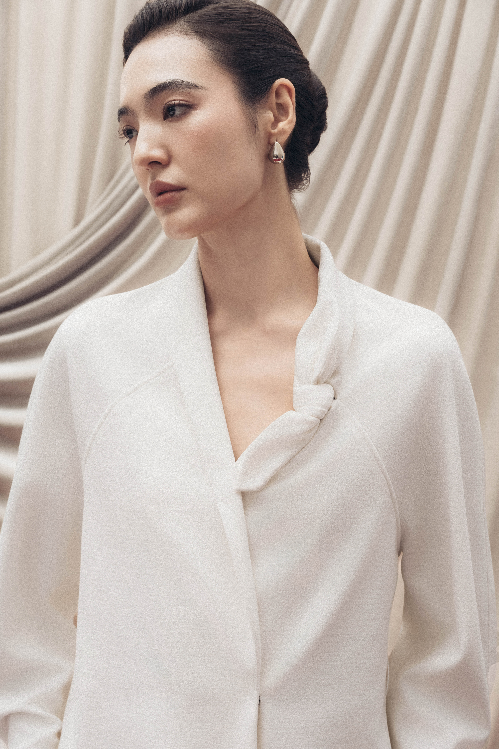 Asymmetric Bow Wrap Coat & Cut Midi Skirt in Cream