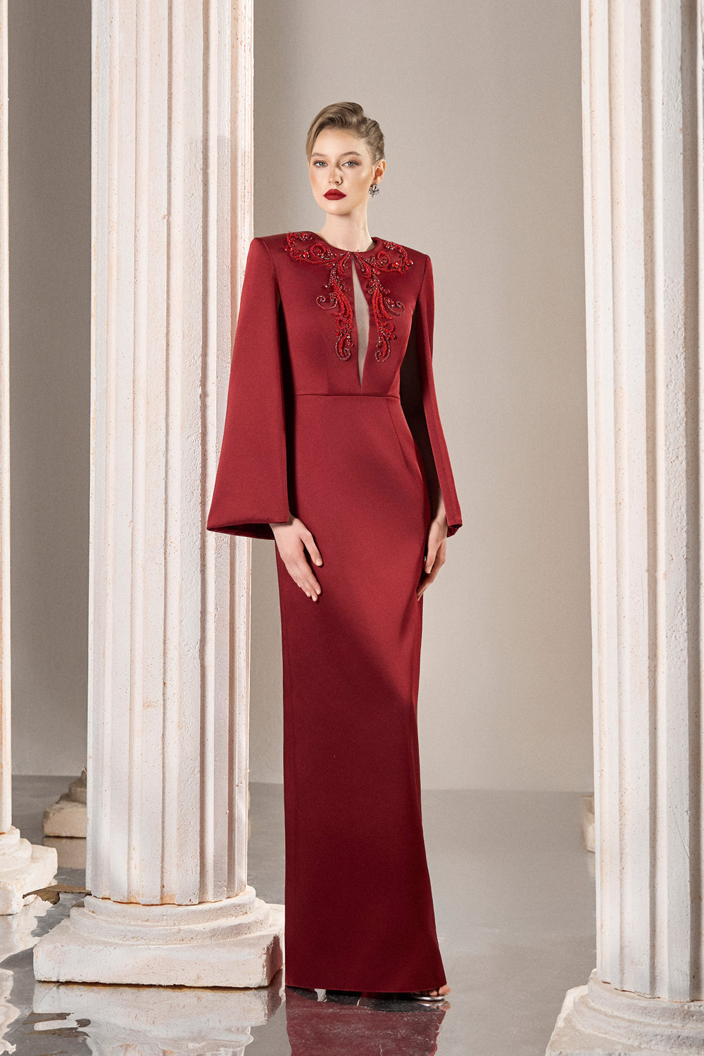 Dress Structured taffeta gown, crystal bodice, dramatic slit sleeves