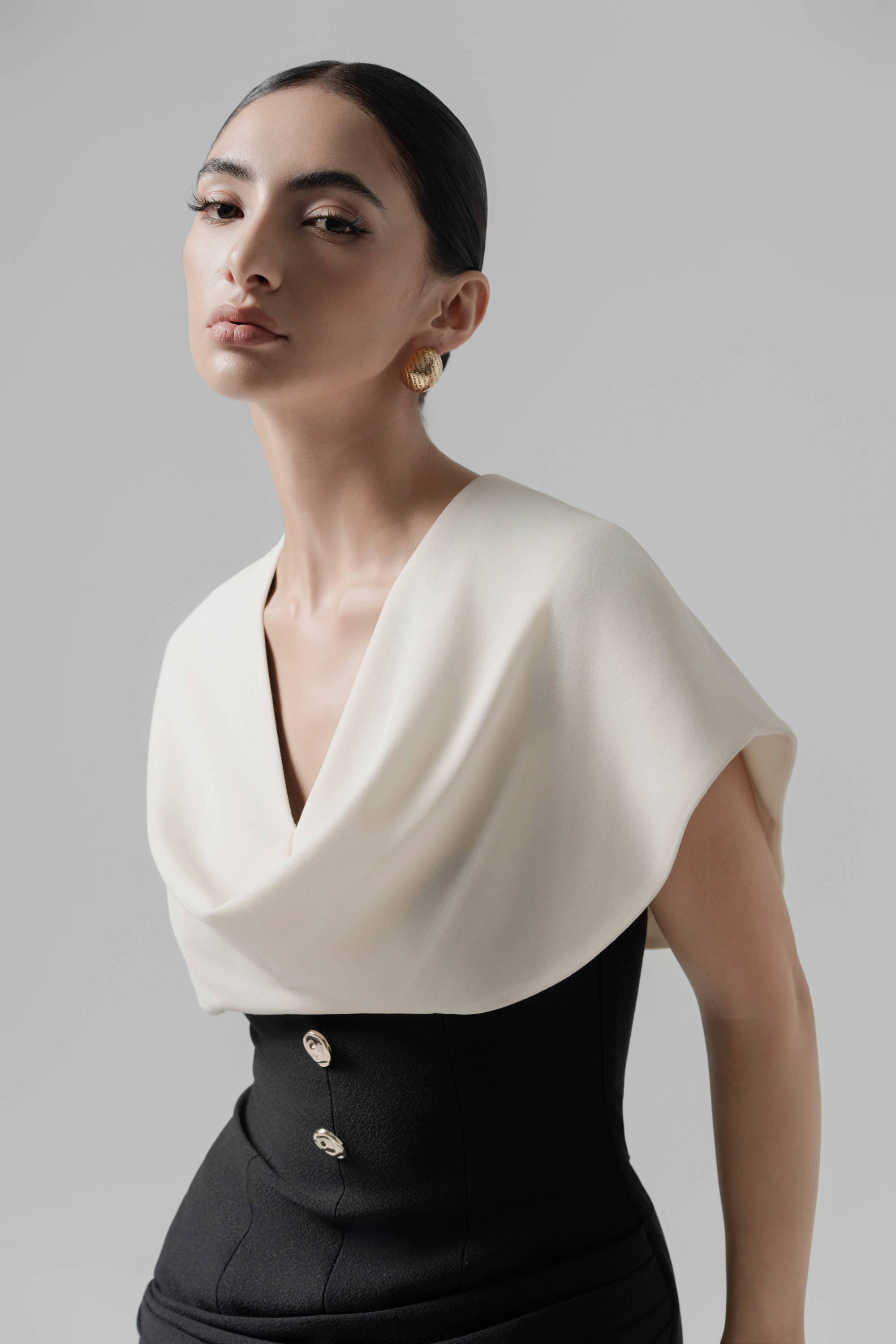 cream and black peplum dress Strapless mini dress with lace-trimmed peplum in cream