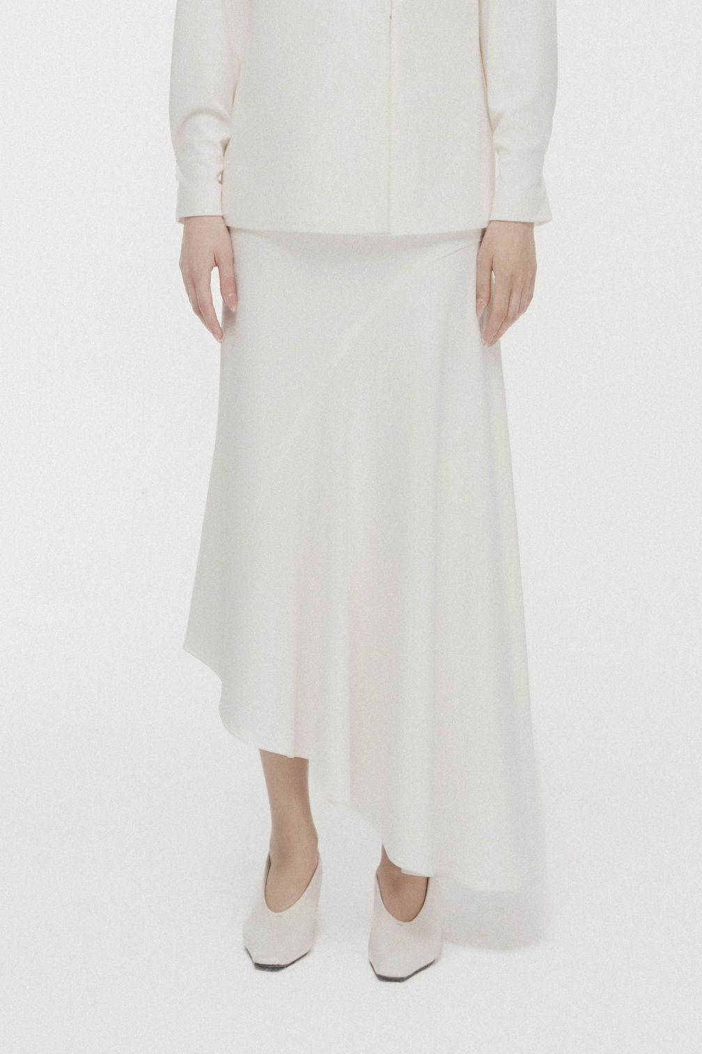 Fluid Bias-Cut Midi Skirt in Cream