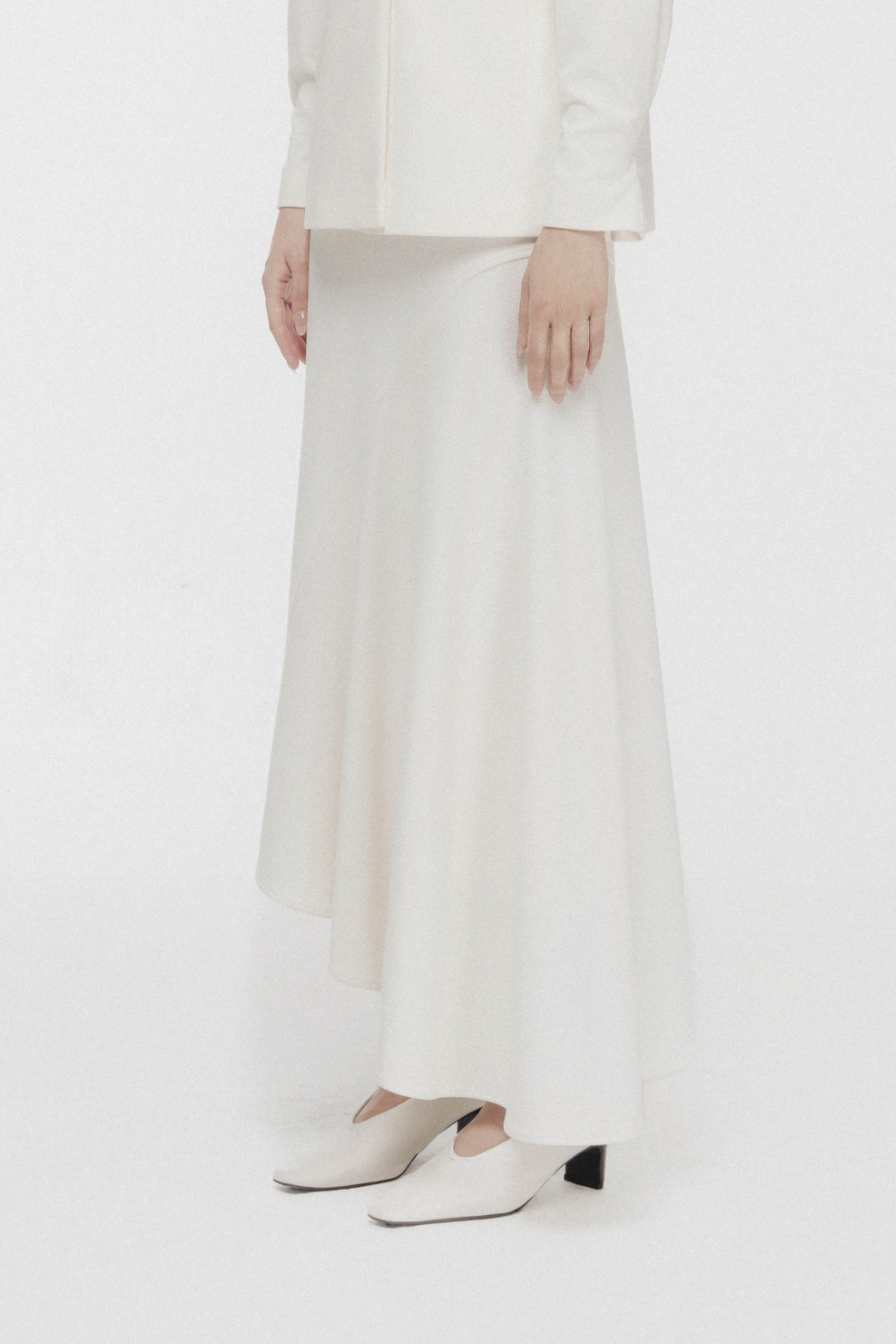 Fluid Bias-Cut Midi Skirt in Cream