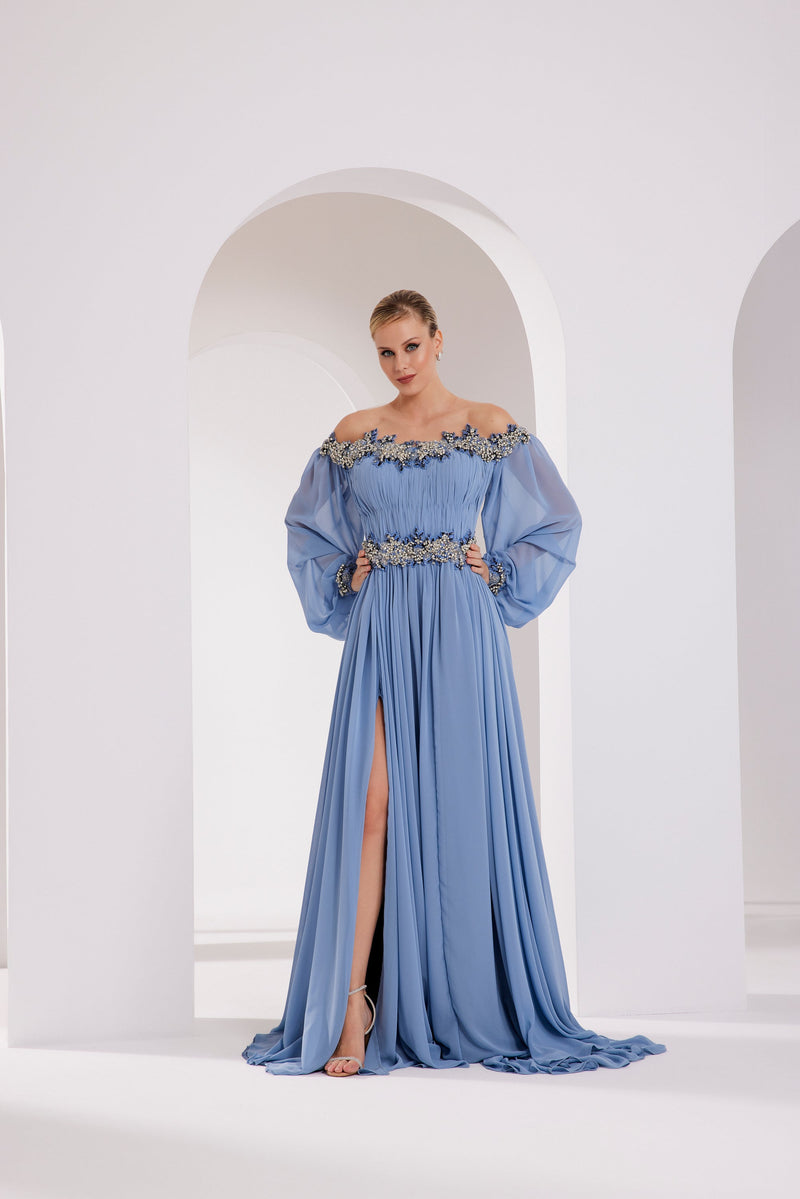 Li Beirut M1012 – Off-Shoulder Draped Gown with Sheer Sleeves & Embellished Waist
