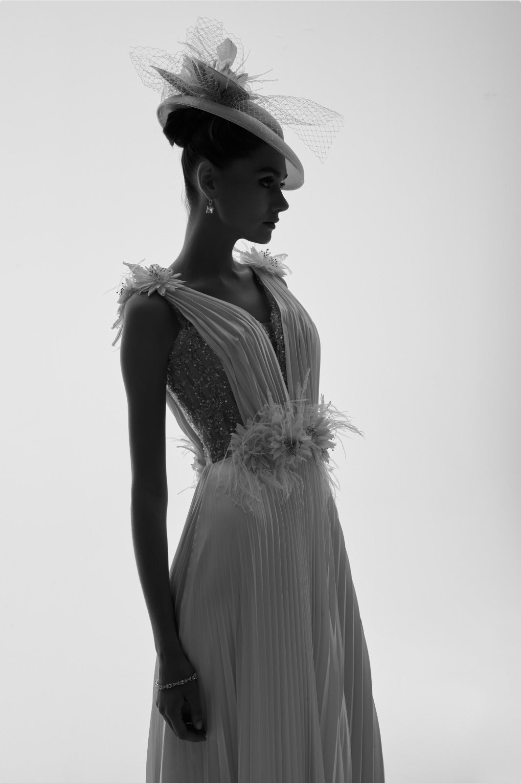 Li Beirut M1120 – Ivory V-Neck Pleated Chiffon Gown with Floral Waist Detail