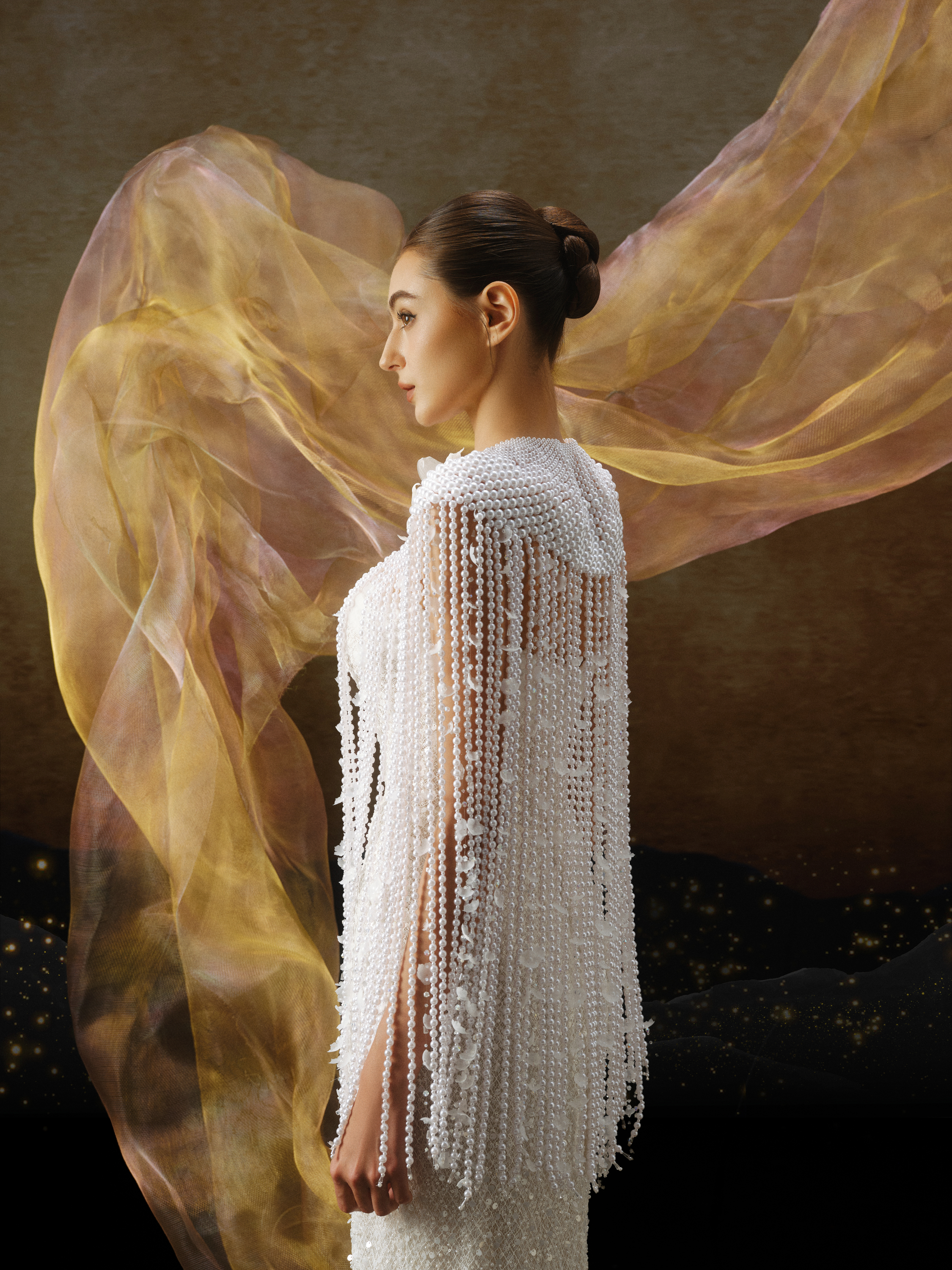 Linh Nga LMBCT298 – Strapless Beaded Gown with Sheer Cape Overlay