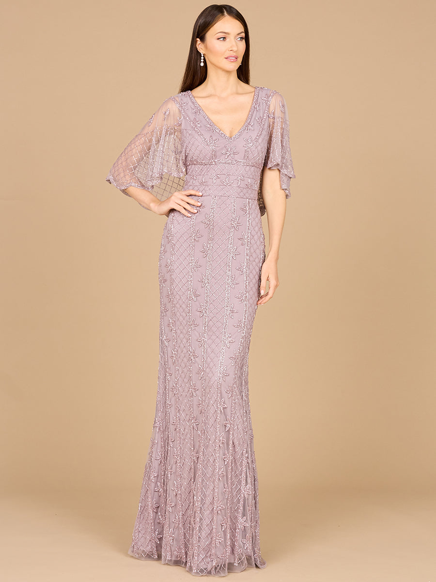 Style 29023 – Lilac Beaded Cape Sleeve Mermaid Gown | High Back Modest Evening Dress