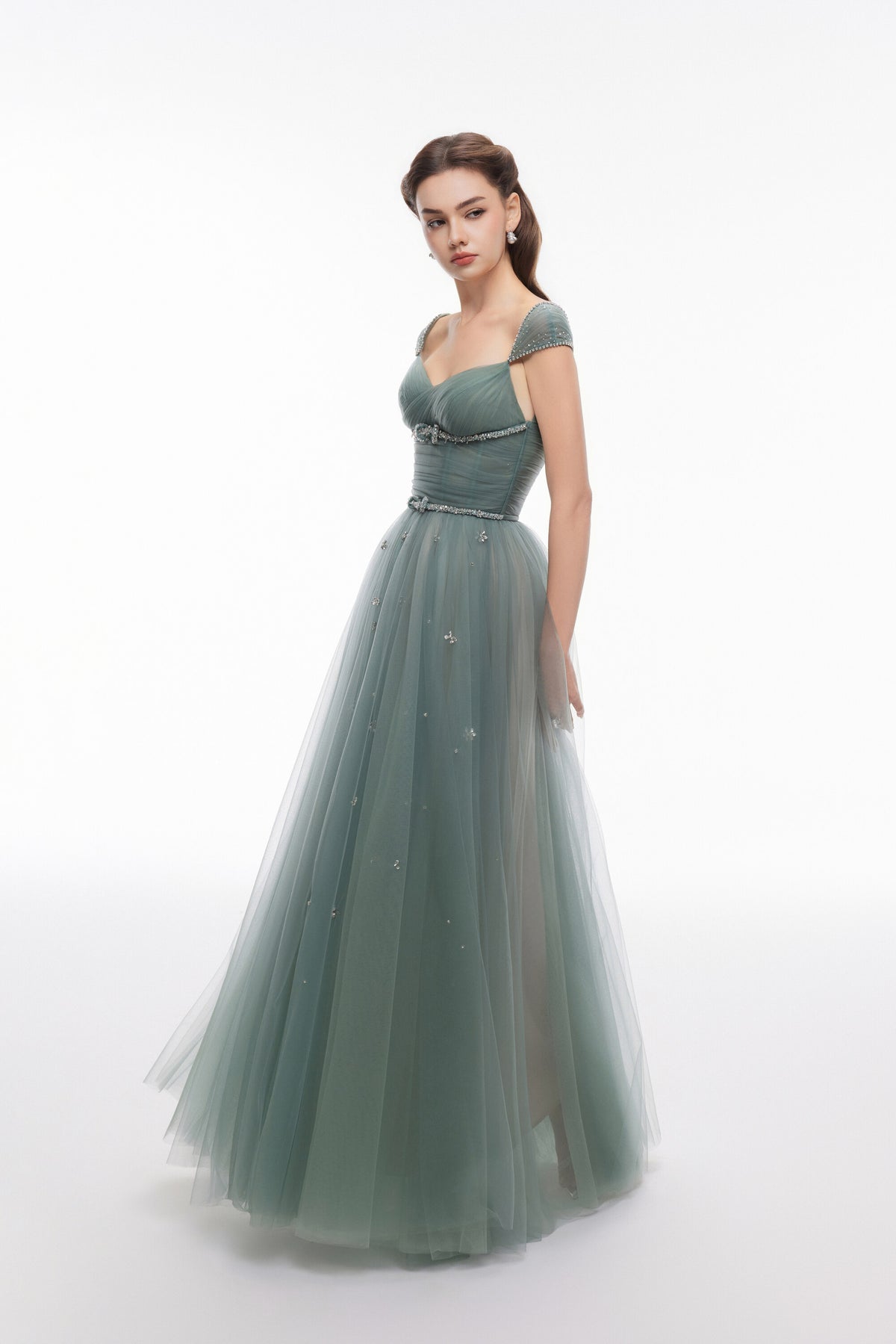 NEALA green A-line gown with sweetheart neckline and layered sheer skirt, full-length front view