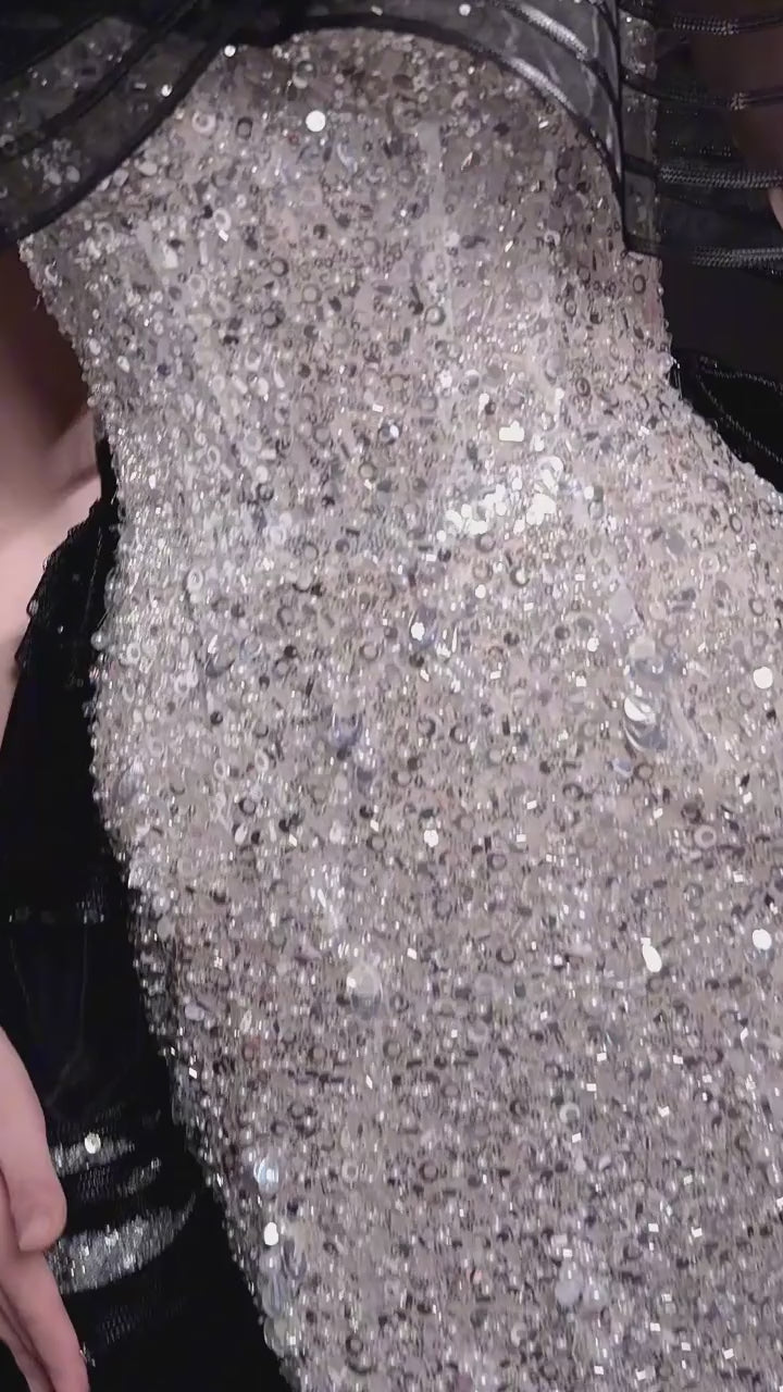 LINH NGA close-up of silver embellishment on the gown.